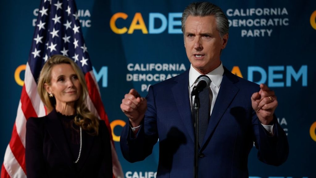 WOAH! – Gavin Newsom’s Wife Pushes Him Then Humiliates Him On Stage